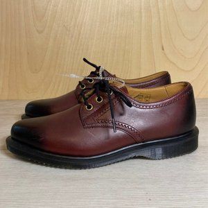 Dr. Martens Black and Brown Flats with Durable Rubber Sole
